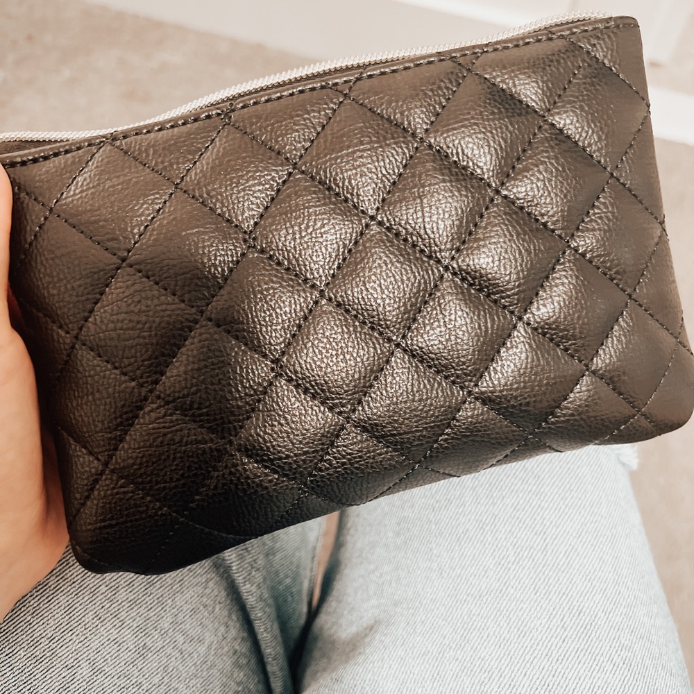 Black cosmetic bag, oils, or other use